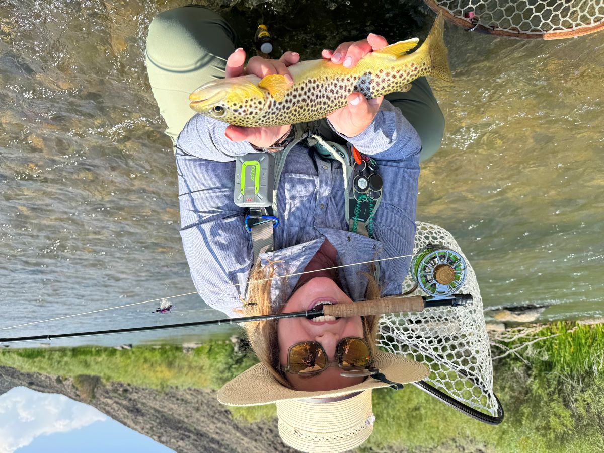 Flyfisher woman with trout